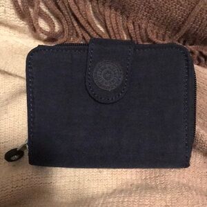 NWOT Kipling blue, water resistant wallet